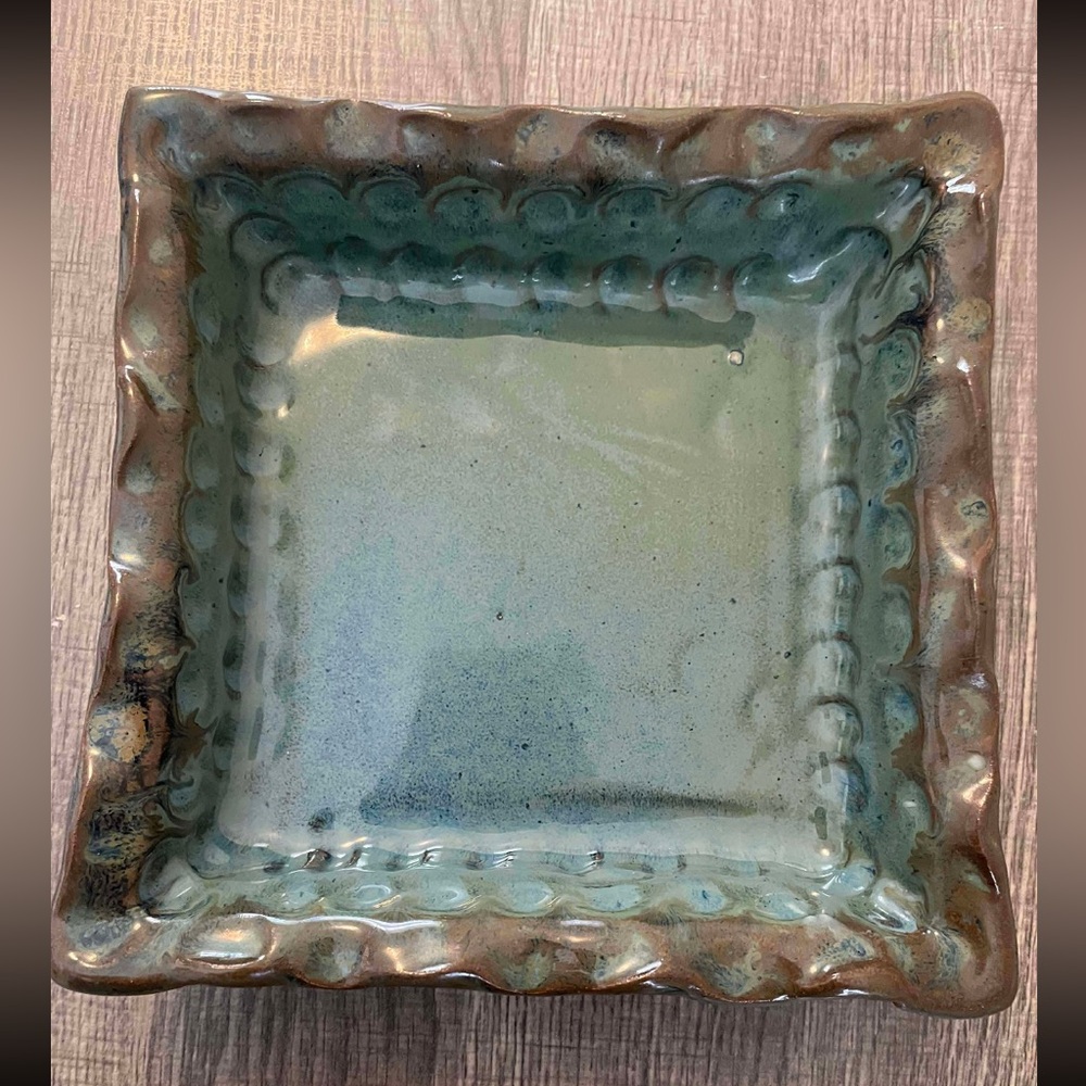 Tan Leather Item with Logo(pottery)